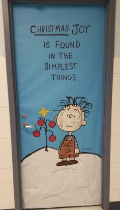 a door decorated with the words christmas joy is found in the simplest things