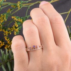 "Crown ring, Gold wedding ring, Amethyst ring, Rose gold ring, Purple stone ring, February birthstone, Women wedding ring, Gold crown ring WE OFFER UNLIMITED PERIOD INSTALLMENTS PLAN This is a beautiful, stunning, feminine ring that works well for all occasions, styles, and ages. You will love it! Ring information: Stone: Amethyst Approximate size: central stone - 2mm, 2 accent stones 1.5mm Metal type: Gold Metal stamp: 14k Gold Customization / Replacements It's easy to create jewelry that's per Dainty Rose Gold Amethyst Promise Ring, Rose Gold Amethyst Birthstone Ring For Promise, Rose Gold Amethyst Birthstone Promise Ring, Rose Gold Crown Design Ring As Gift, Dainty Rose Gold Amethyst Wedding Ring, Promise Amethyst Ring In Rose Gold, Rose Gold Amethyst Gemstone Ring For Promise, Rose Gold Amethyst Ring For Promise, Promise Rose Gold Amethyst Gemstone Ring