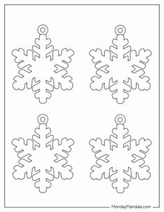 four snowflakes that have been cut out to look like they are in different directions