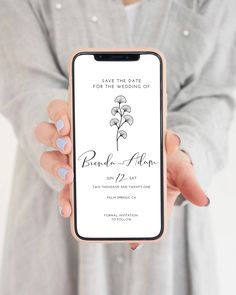 a person holding up an iphone with a wedding program on the screen in their hand