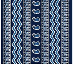 a blue and white striped background with an ornate design on the bottom half of it