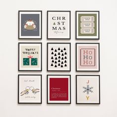 six framed christmas cards on a wall with holiday greetings in different styles and colors