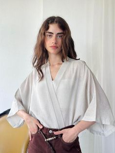 Meet your new favorite wardrobe staple - the Textured Perforated Mini Kimono by Retrobird Design! This perfect boho cover-up is all about effortless style and versatility. Whether you're throwing it over crop tops for a casual vibe, or layering it as a bridal robe or bridesmaid robe, this kimono has you covered. With its vintage flair and Japanese fabric, it seamlessly blends into any outfit, from crochet cardigans to wrap dresses. Designed with inclusivity in mind, our kimono is available in pl Cardigan Au Crochet, Crochet Cardigans, Transparent Dress, Silk Kimono Robe, Bridal Robe, Wrap Dresses, Bridesmaid Robes, Bridal Robes, Womens Robes