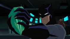 batman and robin wayne in the animated version of batman's dark knight adventure, which is