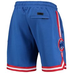 For a comfortable pair of cotton shorts that can't be beat, grab these Team shorts from Pro Standard. Featuring standout Chicago Cubs graphics on both legs, these shorts ensure your fandom will always be noticeable. Whether lounging on the couch or out and about, keep your Chicago Cubs pride fully visible with these shorts. Brand: Pro Standard Heat-sealed chenille applique with embroidered details Heat-sealed fabric applique with embroidered details Imported Inseam for Size M measures approx. 9' Athletic Shorts With Elastic Waistband For Sports, Sporty Bermuda Moisture-wicking Shorts, Bermuda Sports Shorts With Elastic Waistband, Sporty Bermuda Shorts With Moisture-wicking, Cotton Athletic Shorts For Sports Events, Blue Shorts With Comfort Waistband, Blue Comfort Waistband Shorts, Moisture-wicking Cotton Bottoms In Short Length, Moisture-wicking Cotton Shorts For Loungewear