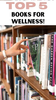 a person reaching for books on a book shelf with text overlay that reads top 5 books for wellness