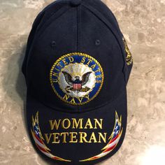 This Us Navy Woman Veteran Has The Navy Crest Embroidered On The Crown With The Woman Warrior Insignia Embroidered On The Side And Gold Embroidered Lettering On The Bib And On The Rear Above Nd On The Adjustable Strap. Us Navy Women, Woman Warrior, The Navy, Us Navy, Navy Women, Adjustable Hat, The Crown, Soldier, Trucker Hat