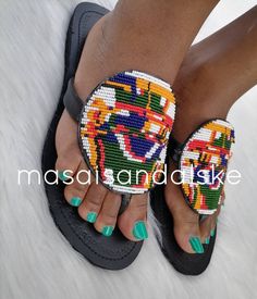 100% handmade using leather and fine beads. Masai beaded sandals are made using the pure original leather and quality African beads.They are inspired by the Masai community They are perfect for any occasion. True to size. We ship worldwide. Feel free to send me a convo for any clarifications Artisan Multicolor Open Toe Sandals, Handmade Multicolor Sandals For Vacation, Artisan Multicolor Sandals For Festivals, Handmade Multicolor Open Toe Ring Sandals, Handmade Multicolor Open Toe Sandals, Multicolor Leather Flip Flops For Vacation, Handmade Multicolor Open Toe Barefoot Sandals, Handmade Multicolor Toe Ring Sandals, Traditional Multicolor Toe Post Sandals