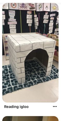 an image of a dog house made out of cardboard and paper machs with the words reading igloo on it