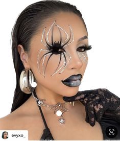 a woman with spider makeup on her face