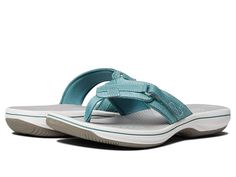 Clarks Breeze Sea - Women's Sandals : Teal 2 : Add some floral design to your warm-weather wear with the Clarks Breeze Sea slip-on sandal. Synthetic upper with an adjustable hook-and-loop closure for a secure fit. Soft fabric lining ensures an abrasion-free environment for all-day wear. EVA-cushioned footbed and midsole massages the foot with each and every step. TPR outsole delivers long-lasting durability on a variety of surfaces. Imported. Measurements: Weight: 5 oz Product measurements were Spring Outdoor Slip-on Slides, Spring Sandals For Outdoor Activities, Spring Slip-on Slides For Outdoor Activities, Comfortable Sandals For Outdoor Spring Activities, Comfortable Slides For Spring Outdoor Activities, Spring Slides With Adjustable Arch Support, Adjustable Slides With Arch Support For Spring, Lightweight Flip Flops For Outdoor, Adjustable Sport Sandals For Beach And Outdoor Use