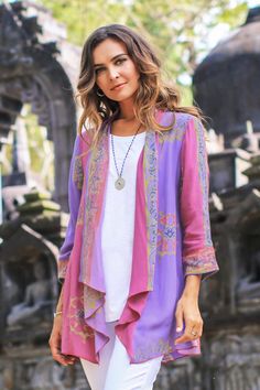 By Wayan Arta and Sharon in Bali this kimono jacket makes the perfect cover-up during the fall and spring seasons. Crafted from suave rayon this lightweight jacket is decorated using the batik method; a wax resist is stamped by hand onto the fabric before it is treated with colorful dyes resulting in vibrant hues of fuchsia lilac violet and mulberry decorated by garden vine motifs. Cheap Fitted Bohemian Outerwear, Cheap Spring Festival Outerwear, Jackets Design, Diy Cardigan, Wax Resist, Upcycle Jeans, Lovely Tops, Boho Kimono, Womens Kimono