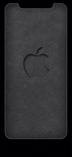 an apple logo is shown on the back of a black leather ipad case that has been stitched together