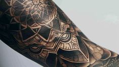 Detailed geometric arm tattoo design with intricate patterns and cultural significance. Meticulously crafted body art showcasing light and shadow play. Geometric Arm Tattoo, Arm Tattoo Design, Tattoo Work, Tattoo Artist, Light And Shadow, Arm Tattoo, Tattoo Design, Geometric Tattoo, Tattoo Artists