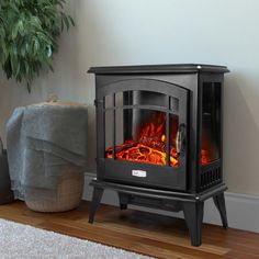 20 in. 1500-Watt Freestanding Compact Electric Infrared Quartz Fireplace Heater w/ 3-Sided Glass Panels in Vintage Black - Super Arbor Quartz Fireplace, Electric Stove Heaters, Standing Fireplace, Portable Fireplace, Stove Heater, Electric Fireplace Heater, Fireplace Heater, Freestanding Fireplace, Portable Heater