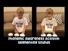 two young boys are playing with some white frisbees in front of a couch