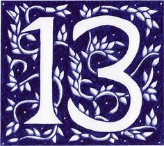 a blue and white drawing of the number thirteen with leaves on it's sides