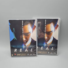 two dvd's sitting side by side on top of each other in front of a gray background