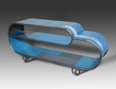 an image of a blue and grey bench with wheels in the shape of a rectangle