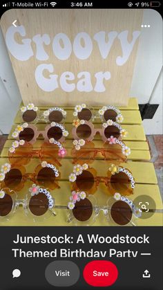 the glasses are made out of wood and have flowers on them