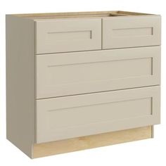 a white dresser with two drawers and no doors on the bottom drawer, in front of a white background