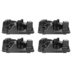 four black plastic parts for the front and side of a car on a white background