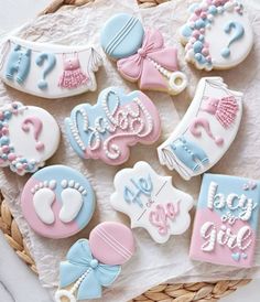 decorated cookies in pastel blue, pink and white