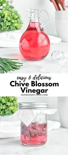 a bottle filled with pink liquid next to another jar full of flowers and herbs on a table