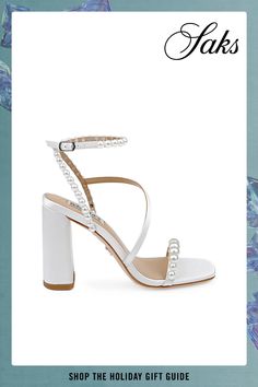 These Jordyn sandals from Badgley Mischka are crafted of satin and embellished with lustrous imitation pearls. Open toe Buckle closure Satin upper Leather lining Leather sole Imported SIZE Heel: about 3.35 (85mm) Badgley Mischka, White Satin, Open Toe, Apparel Accessories, Buckle, Satin, Sandals, Heels, Leather