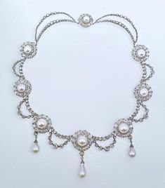 Victorian rose cut diamond and pearl 925 sterling silver queen Alexandra ' wedding necklace Hanmade Metal: Sterling Silver Metal Purity:925 Metal weight: 35.99 gram Stone :Rose Cut Diamond Diamond Ctw:15.90ctw Gemstone: pearl Gemstone weight:12.989 ct Item length:22.5 in Silver Bridal Jewellery, Queen Alexandra, Pearl And Diamond Necklace, Royal Jewels, Pearl Gemstone, Choker Necklaces, Rose Cut Diamond, Wedding Necklace, Rose Cut