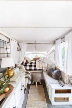 the inside of a camper is shown with an advertisement