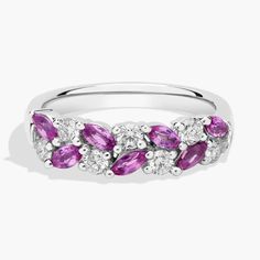 Elegant and unique, this stunning ring features marquise-cut pink sapphires and round-cut diamonds set in a dazzling array along the front of the band. The cool gleam of the 14k white gold completes the luxurious design. Sapphire Eternity Band, Sapphire And Diamond Ring, Luxurious Design, Platinum Ring, Marquise Cut, Precious Gemstones, Round Cut Diamond, Eternity Bands, The Cool