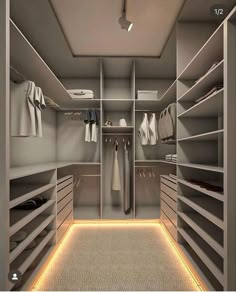 a walk in closet with lots of shelves and drawers