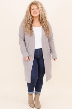 This cardigan was made for cuddle weather! It has a solid neutral color you can style for every occasion! It's comfortable for all day wear, has a figure-flattering fit, and even features pockets! Simply pair this cardigan with a patterned top or basic dress for an easy everyday look! 90% Polyester, 5% Rayon, 5% Spandex Made in the USA. Cozy Fit Soft Knit Everyday Cardigan, Cozy Everyday Cardigan With Pockets, Comfy Fall Cardigan For Everyday, Comfy Everyday Fall Cardigan, Comfortable Everyday Soft Knit Outerwear, Cozy Everyday Cardigan, Everyday Comfy Soft Knit Cardigan, Comfy Everyday Soft Knit Cardigan, Comfortable Fall Everyday Cardigan