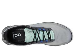 the back side of a person's shoe with blue and black laces on it