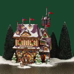 a christmas house with lights and decorations on it