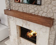 a fireplace with a fire burning in it