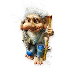 a statue of an old troll holding a baseball bat and wearing white hair, sitting on a white background