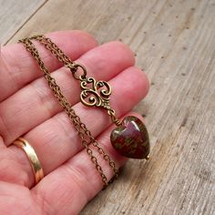 I had to buy just a few of these wonderful, rustic, earthy beads. They are each unique and beautiful. I have them available (so far) in red/olive green, blue/brown mix, and a red/brown mix. I tried to show a variety of the colors. For the earrings, I match as closely as possible. Each side may be different too. These are 15x16mm puffy heart beads in a mix of blue and cream glass. With an earthy Picasso finish. As I mentioned, each bead is different. Your necklace may not be exactly as shown, but Rustic Boho, Puffy Heart, Fall Jewelry, Copper Necklace, Victorian Jewelry, Gift For Wife, Copper Earrings, Heart Beads, Blue Heart