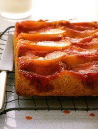 a close up of a cake on a cooling rack