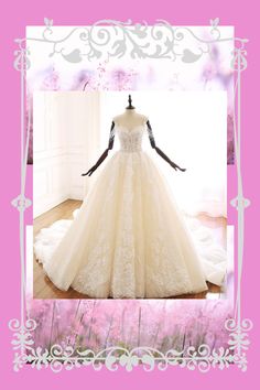 a wedding dress is displayed on a mannequin in front of a pink background