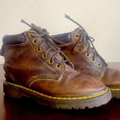 90s Vintage!!! Original Made In England Doc Martens Brown Leather 6 Eye Boot. Classic Yellow Doc Martens Stitching, Womens Size 5 Equivalent. Very Nice Vintage Patina. Original Laces. Yellow Doc Martens, Brown Leather Boots, Doc Martens, 90s Vintage, Leather Boots, Bootie Boots, Brown Leather, Patina, Ankle Boots