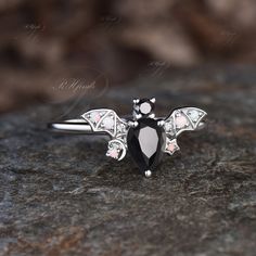 Black Birthstone Jewelry For Promise Ring, Black Sterling Silver Birthstone Rings, Black Sterling Silver Rings With Birthstone, Black Moonstone Gemstone Ring, Black Opal Gemstone Ring, Black Multi-stone Wedding Jewelry, Fine Jewelry With Black Multi-stone, Black Multi-stone Round Rings, Black Multi-stone Fine Jewelry