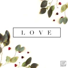 the word love is surrounded by leaves and berries on a white background with black letters