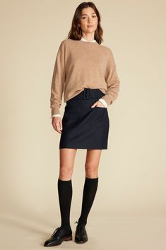 This paneled mini skirt will be a standout in your wardrobe. It features patch pockets on the front for interest and a wide matching belt to accentuate the waist. Our stylist loves it with bare legs and loafers or tights and high boots. DESIGN- Slim fit. Size up for a more relaxed look.- A paneled mini skirt with fitted waist and patch pockets on the front.- Detachable wide belt with fabric covered buckle, hidden side zipper.- Length: 17 5/8" FABRIC & CARE- 50% polyester, 50% RWS wool- Lining: 1 Fall Mini Pencil Skirt With Pockets, Business Casual Relaxed Skirt With Pockets, Blue Pencil Skirt For Workwear In Fall, Blue Fall Pencil Skirt For Work, Mini Skirt With Belt Loops For Workwear, Fall Pencil Skirt Skort For Workwear, Fall Workwear Pencil Skirt Skort, Fall Mini Skirt With Pockets For Work, Blue Mini Skirt For Workwear In Fall