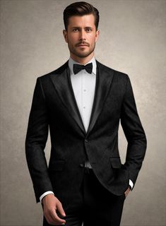 Command the room at any event with our Italian Toscato Tuxedo Blazer, where timeless elegance meets contemporary flair. This blazer, expertly crafted from a high-quality polyester blend, promises both comfort and style. The sophisticated jacquard design in a rich black hue ensures you stand out, whether at a glamorous awards ceremony, your special wedding day, or a chic night on the town. Make this blazer your essential pick for every landmark occasion.  An elusive unique piece from our Red Carpet Collection.   Look features a 2 button tuxedo jacket with black cherry satin wide peak lapel, matching satin covered buttons, single vent and three cuff buttons.   Click 'Customize Now' to modify the look if needed.   Jacket is fully lined.  Lining: Viscose.     We have sourced stocks from the fi Black Suit Men, Black Suit Wedding, Winter Suits, Slim Fit Tuxedo, Tuxedo Blazer, Jacquard Design, Linen Suits, Tuxedo Wedding, Custom Suit