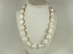 "Contains small parts! Not for children! Choking Hazard!Genuine white baroque pearl necklace, statement white pearl necklace, chunky white baroque pearl jewelry Really stunning, large baroque pearl necklace. Pearls are huge app 20-27 mm  length and 18-20 mm wide.  High Quality pearls. 925 Sterling silver findings.   Measurements: 19\" (48 cm) with clasp. Earrings available in Baroque pearl earrings section Each piece of jewelry from my shop comes beautifully packaged in box and ready for gift gi White Baroque Pearl Jewelry, White Baroque Pearl Necklaces, White Baroque Pearl Necklace Gift, Handmade White Baroque Pearl Necklace, Handmade White Baroque Necklaces, White Baroque Necklaces For Wedding, White Baroque Pearl Necklace For Wedding, White Baroque Wedding Necklaces, White Baroque Pearl Necklace With Charm