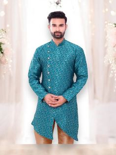 Comes with top and bottom Fabric - Silk Make a statement at any party with our silk kurta pajama for men. The rich silk fabric drapes elegantly, while the contrasting embroidered details add a touch of regal charm. Whether it's a wedding celebration or a festive gathering, this outfit ensures you stand out in style and comfort. Please take note of the following important information regarding the sizing of this Kurta: The chest sizes of this Kurtas is approximately 4 inches larger than the actua Festive Bollywood Silk Sherwani, Silk Long Sleeve Kurta For Festivals, Bollywood Style Silk Bandhgala For Eid, Bollywood Silk Bandhgala For Eid, Festival Silk Long Sleeve Kurta, Silk Bandhgala With Long Sleeves For Eid, Silk Long Sleeve Bandhgala For Eid, Silk Kurta With Long Sleeves And Self Design, Designer Long Sleeve Art Silk Kurta