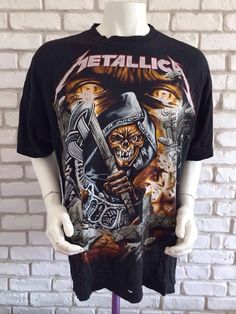 This is a great Metallica shirt from the early 90's The design is awesome, printed back and frontThere are a bunch of holes all over the shirt so please take a look at the picturesSize XL on tagPit to pit : 25,2 inchesTotal length: 28,35 inchesAs for all of my tee shirts, there's only one so take it or miss it :)Other model of Metallica shirt here : https://www.etsy.com/listing/547277108/metallica-1993-vintage-metallifukinca-t?ref=shop_home_active_3To enjoy exclusive updates on all our products, Vintage Cotton T-shirt With All Over Print, Band Merch All Over Print T-shirt For Streetwear, Band Merch T-shirt With All Over Print For Streetwear, Grunge Style Cotton T-shirt With All Over Print, Vintage Short Sleeve T-shirt With All Over Print, Vintage All Over Print T-shirt For Streetwear, Vintage All-over Print T-shirt For Streetwear, Vintage Graffiti Print T-shirt For Concert, Vintage T-shirt With Graffiti Print For Concert