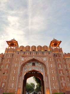 the entrance to an ornately decorated building